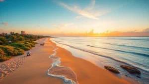 Pôr do sol maravilhoso sobre a Praia de Paripueira, destacando areias douradas e águas calmas.